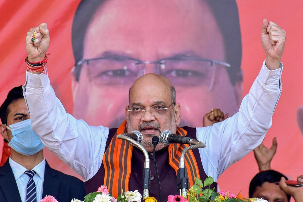 Union Home Minister Amit Shah addresses during an election rally ahead of West Bengal Assembly polls 2021, in West Midnapore district. Credit: PTI Photo. 