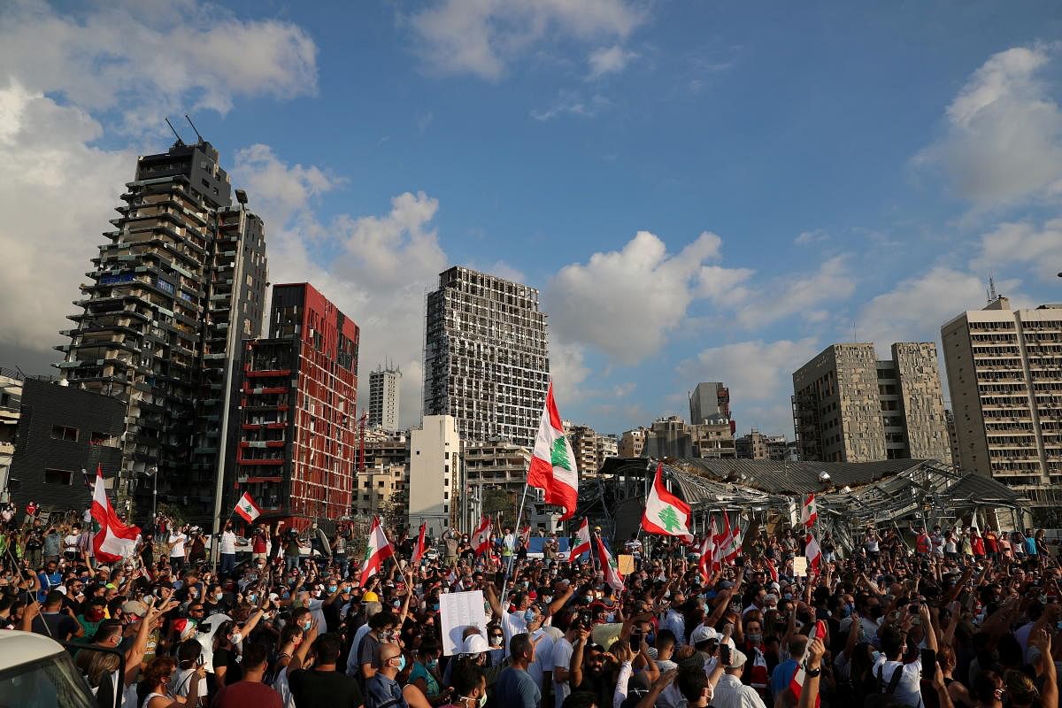 Demonstrators take part in protests near the site of the blast at Beirut's port area, Lebanon. Credit: Reuters. 