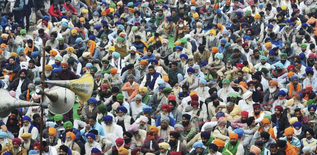  Farmers gather in large numbers at Singhu border during their 'Delhi Chalo' protest march against the Centre's new farm laws, in New Delhi, Friday, Dec. 11, 2020. Credit: PTI Photo