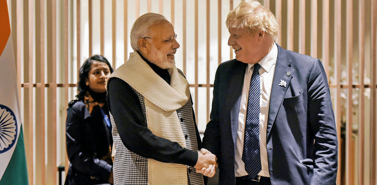 PM Narendra Modi and UK Prime Minister Boris Johnson. Credit: PTI Photo