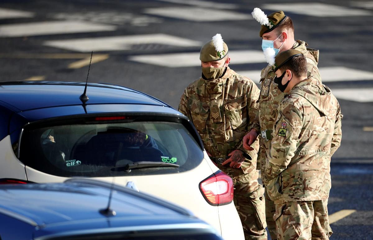 British soldiers check cars at the entrance of the Port of Dover, amid the coronavirus disease (COVID-19) outbreak, in Dover, Britain, December 25, 2020. Credit: REUTERS