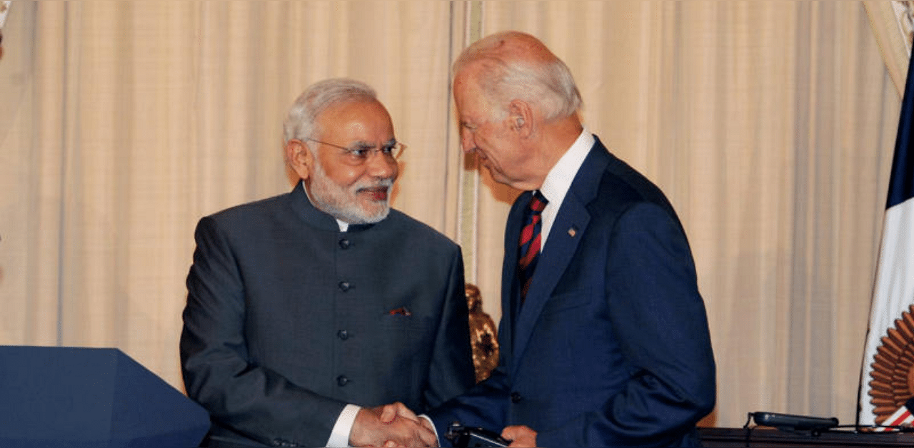 Prime Minister Narendra Modi greets the then US Vice President Joe Biden in Washington DC. Credit: PTI File Photo