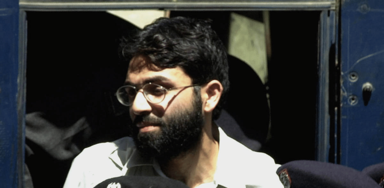 Ahmed Omar Saeed Sheikh, the alleged mastermind behind Wall Street Journal reporter Daniel Pearl's kidnap-slaying, appears at the court in Karachi, Pakistan. Credit: AP/PTI File Photo