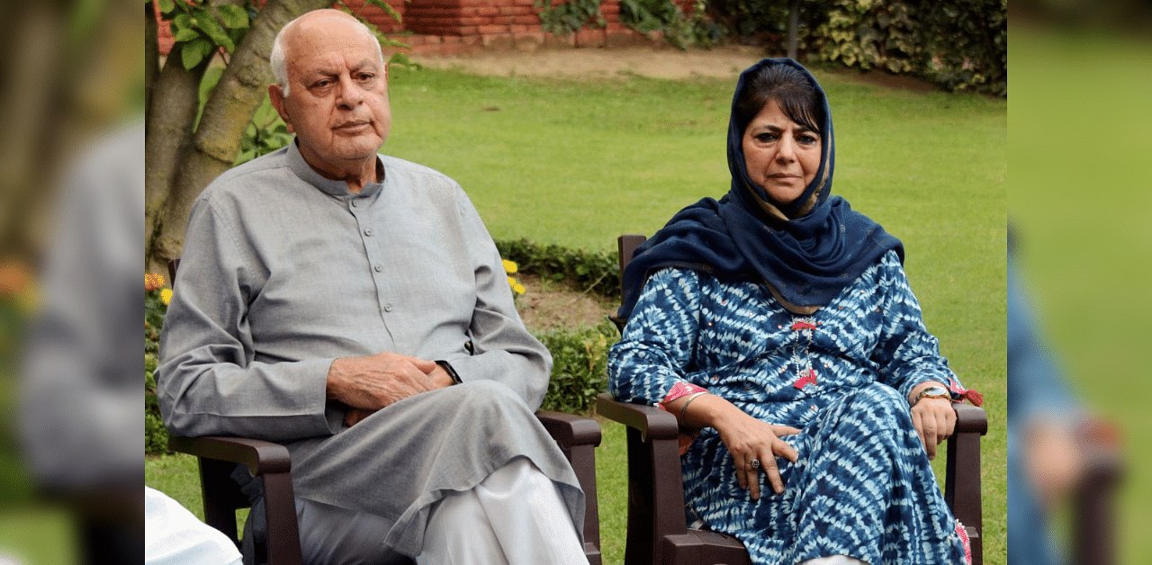  National Conference President Farooq Abdullah and PDP President Mehbooba Mufti. Credit: PTI Photo