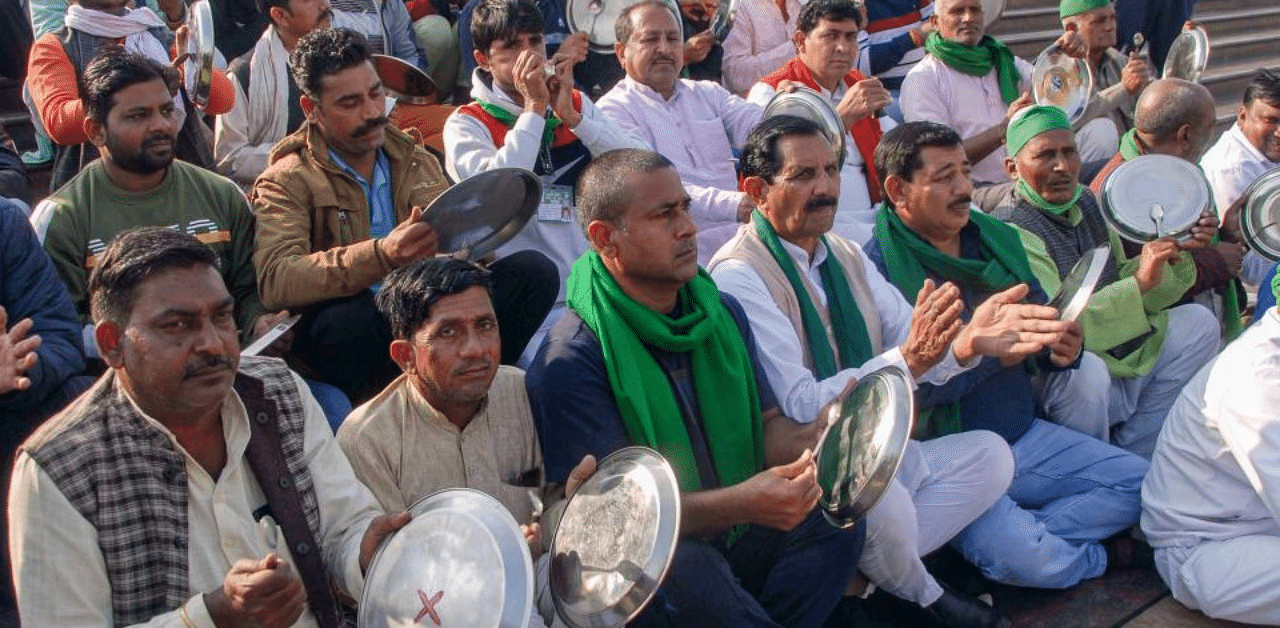 Farmers during a protest against the new farm laws, at Rashtriya Dalit Prerna Sthal and Green Garden in Noida, Friday, Dec. 25, 2020. Credit: PTI Photo