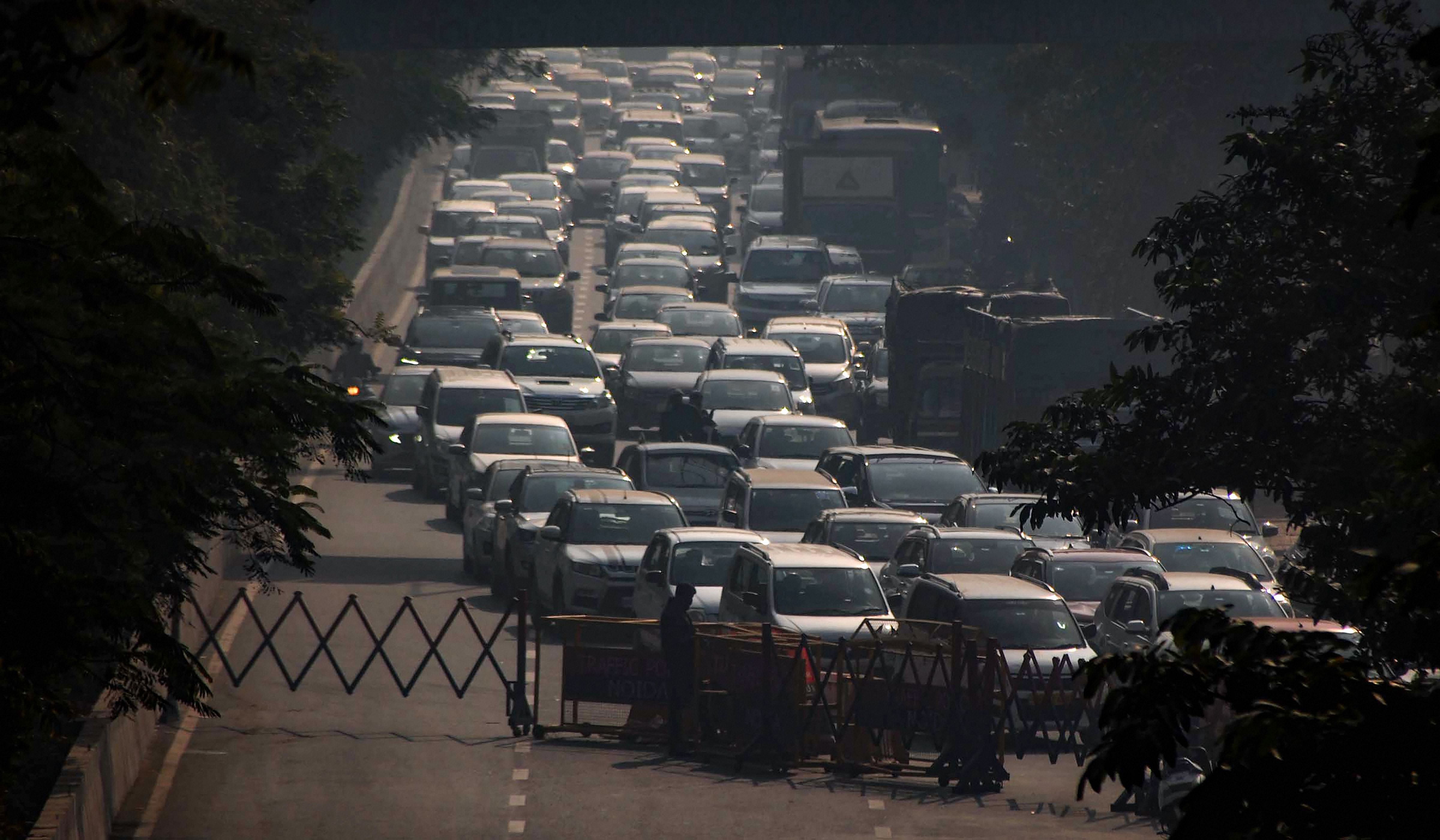  Vehicles stuck in a traffic jam due to farmers protest, at Noida-Delhi border, Thursday, Dec. 24, 2020. Credit: PTI Photo
