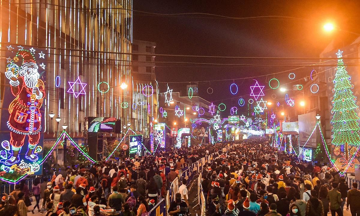 A large number of people gather at Park Street to celebrate Christmas, amid coronavirus pandemic,in Kolkata. Credit: PTI