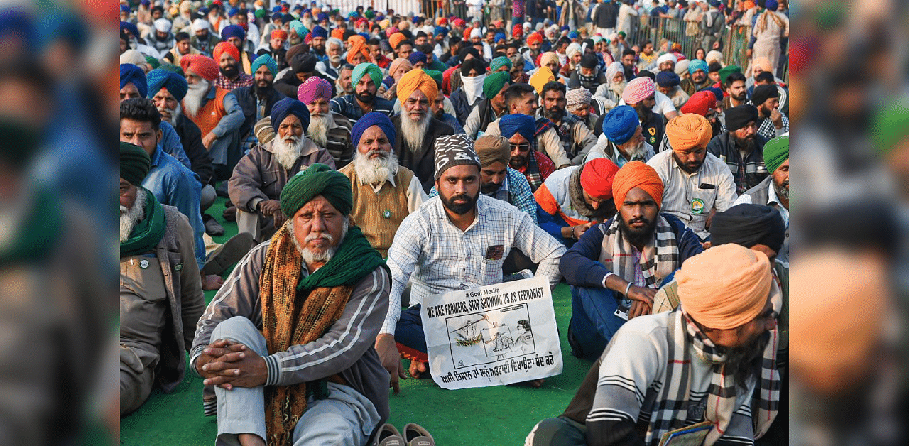 Farmers during their protest against the Center's new farm laws, at Singhu Border in New Delhi, Thursday, Dec. 24, 2020. Credit: PTI Photo