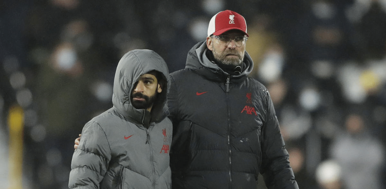 Liverpool's Mohammed Salah (L) and manager Jurgen Klopp (R). Credit: Reuters File Photo