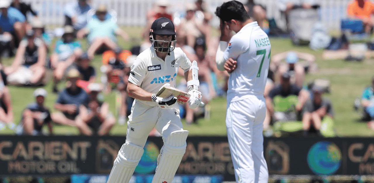 New Zealand’s Kane Williamson makes a run as Pakistan’s Naseem Shah looks on during the first day of the first cricket test match between New Zealand and Pakistan at the Bay Oval in Mount Maunganui. Credit: AFP Photo