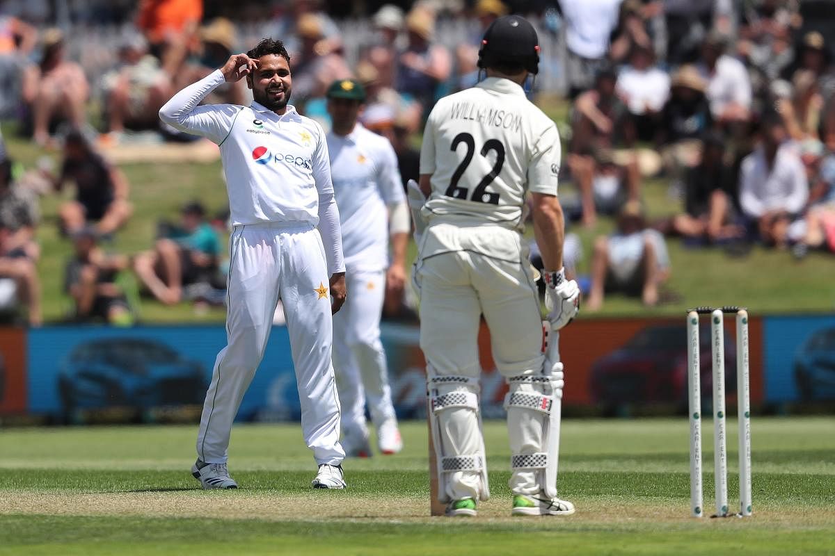 Pakistan’s Faheem Ashraf looks towards New Zealand’s Kane Williamson during the first day of the first cricket test match between New Zealand and Pakistan at the Bay Oval in Mount Maunganui. Credit: AFP. 