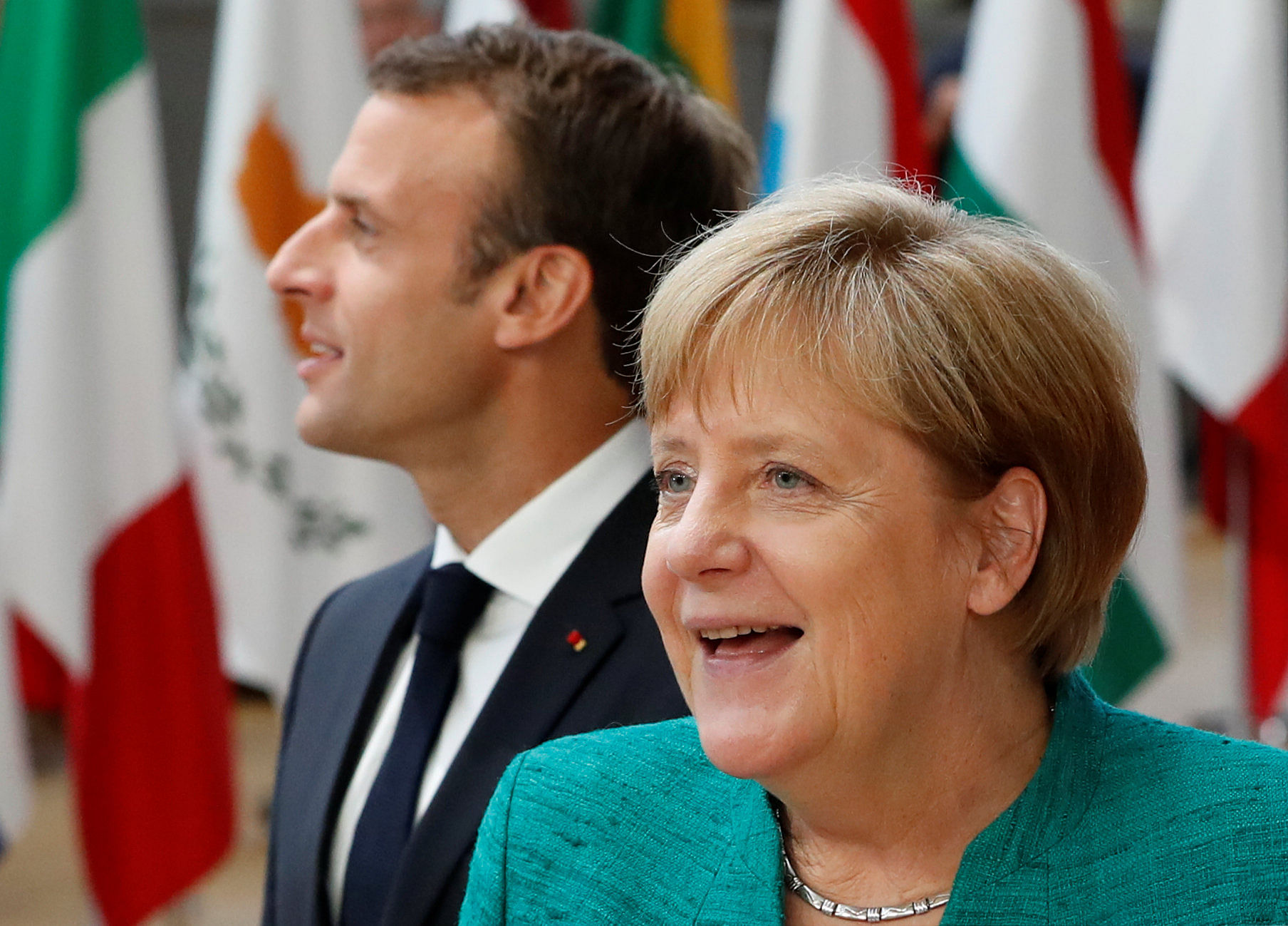 German Chancellor Angela Merkel and French President Emmanuel Macron at an European Union leaders summit in Brussels, Belgium, June 28, 2018. Credit: REUTERS File Photo