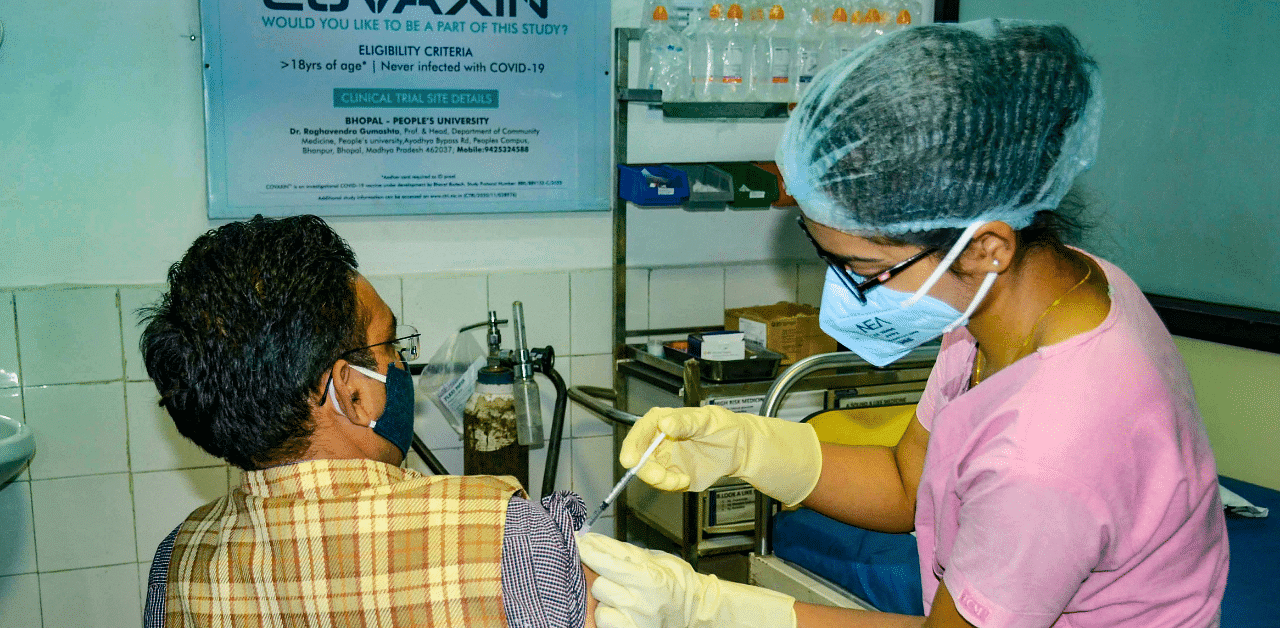 A medic administers Covaxin, developed by Bharat Biotech in collaboration with the ICMR during the Phase- 3 trials in Bhopal. Credit: PTI