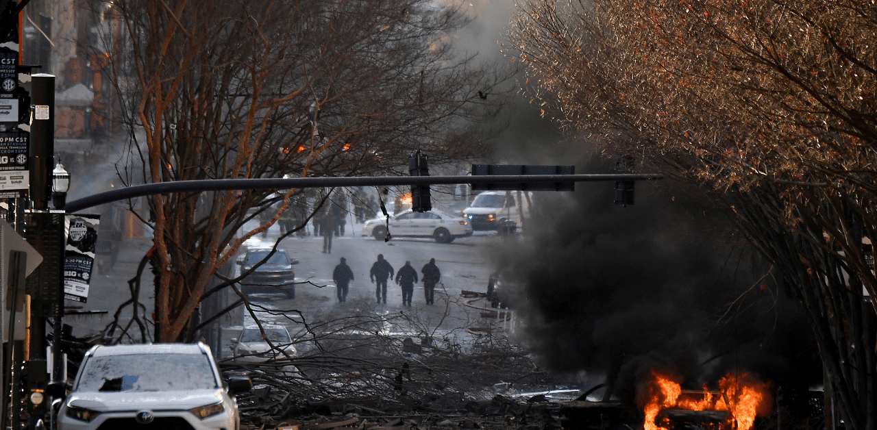 A vehicle burns near the site of an explosion in the area of Second and Commerce in Nashville, Tennessee. Credit: Reuters