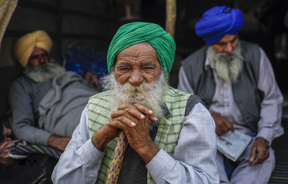 Farmers at Singhu border during their protest against the Centre's new farm laws, in New Delhi, Sunday, Dec. 27, 2020. Credit: PTI Photo