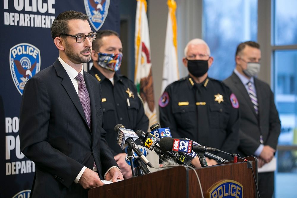 ockford Mayor Tom McNamara talks about the suspected shooter in a triple homicide the night before during a news conference at Rockford Police Department District 3. Credit: AP Photo