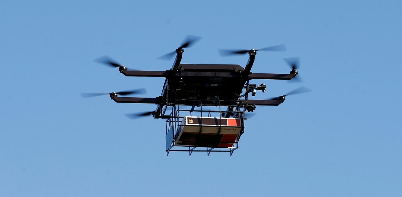 A drone demonstrates delivery capabilities from the top of a UPS truck during testing in Lithia, Florida. Credit: Reuters Photo