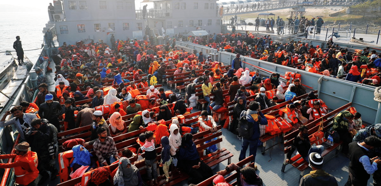 Rohingyas prepare to board a ship as they move to Bhasan Char island near Chattogram, Bangladesh. Credit: Reuters