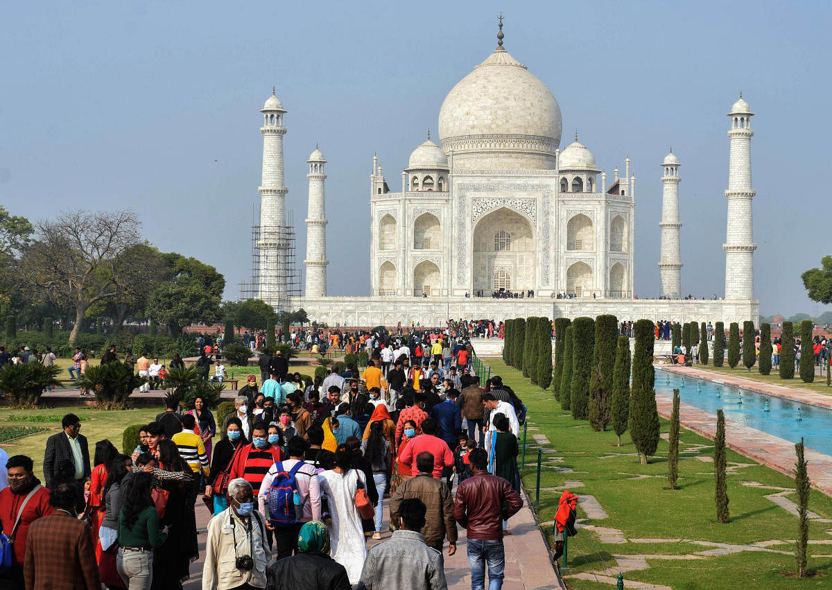 Tourists visit Taj Mahal amid coronavirus pandemic, in Agra. Credit: PTI. 