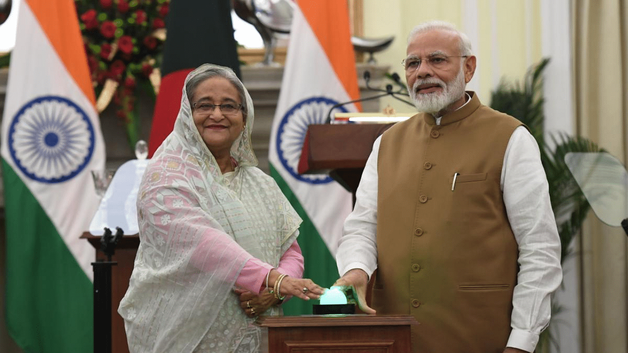 India's Prime Minister Narendra Modi (R) and Bangladesh's Prime Minister Sheikh Hasina. Credit: AFP File Photo
