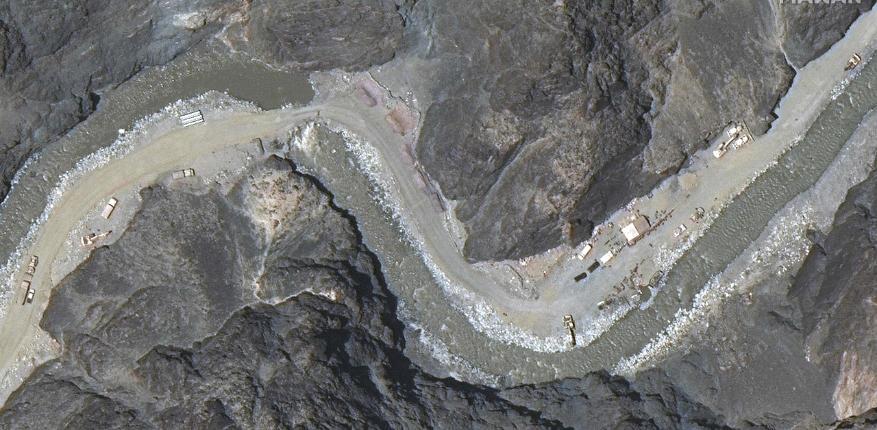 A handout satellite image taken on June 22, 2020 shows road construction near the Line of Actual Control in the eastern Ladakh sector, the border between India and China. Credit: AFP file photo.