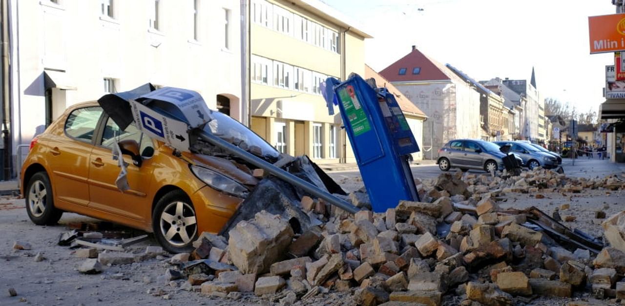 A destroyed car is seen on a street after an earthquake in Sisak, Croatia December 29, 2020. Credit: Reuters Photo