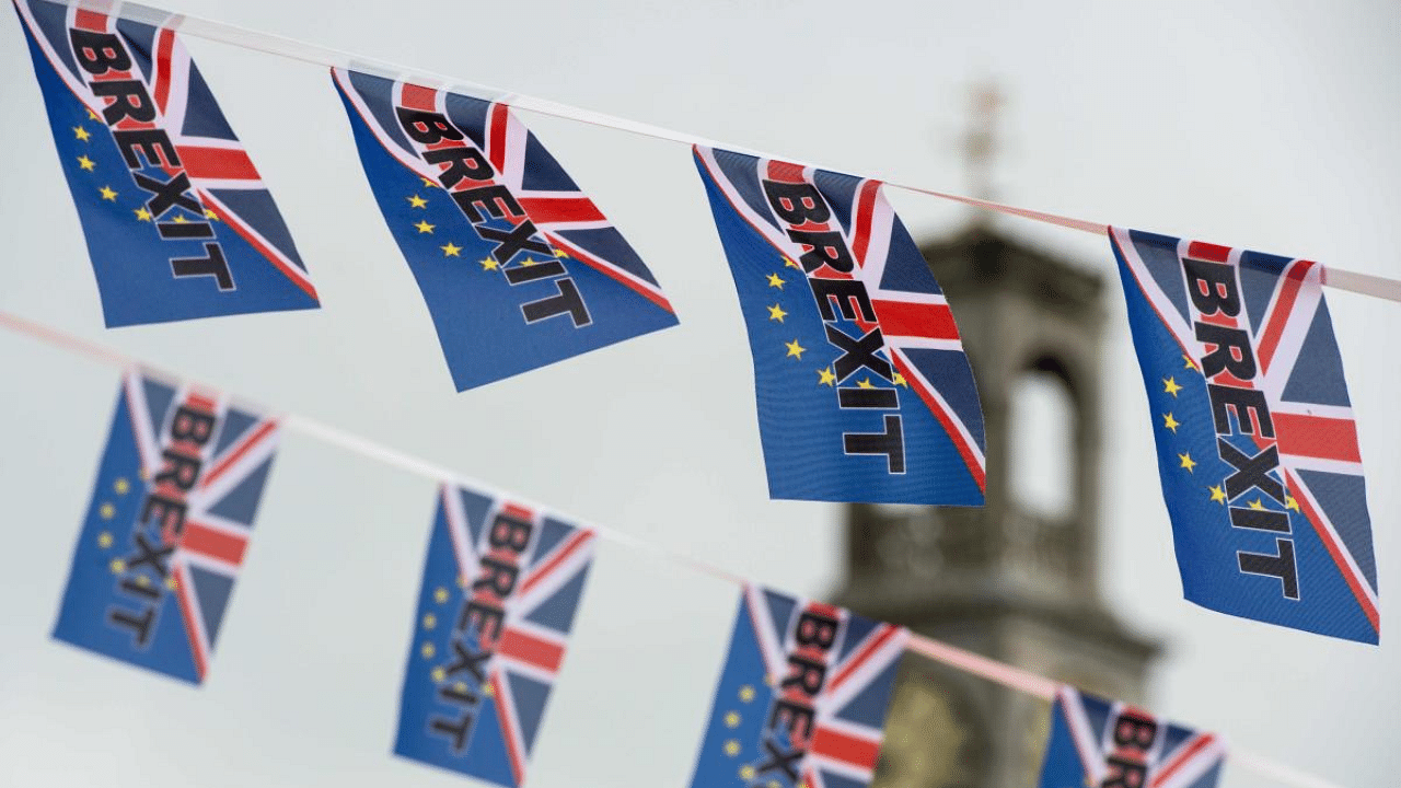 Pro-Brexit flags fly from a fishing boat moored in Ramsgate. Credit: AFP File Photo