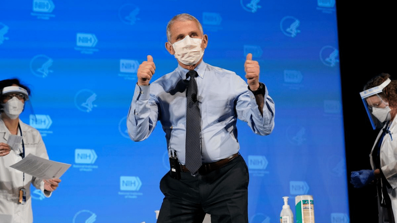 Anthony Fauci, director of the National Institute of Allergy and Infectious Diseases, gestures after receiving his first dose of the Covid-19 vaccine at the National Institutes of Health in Bethesda, Maryland. Credit: AFP
