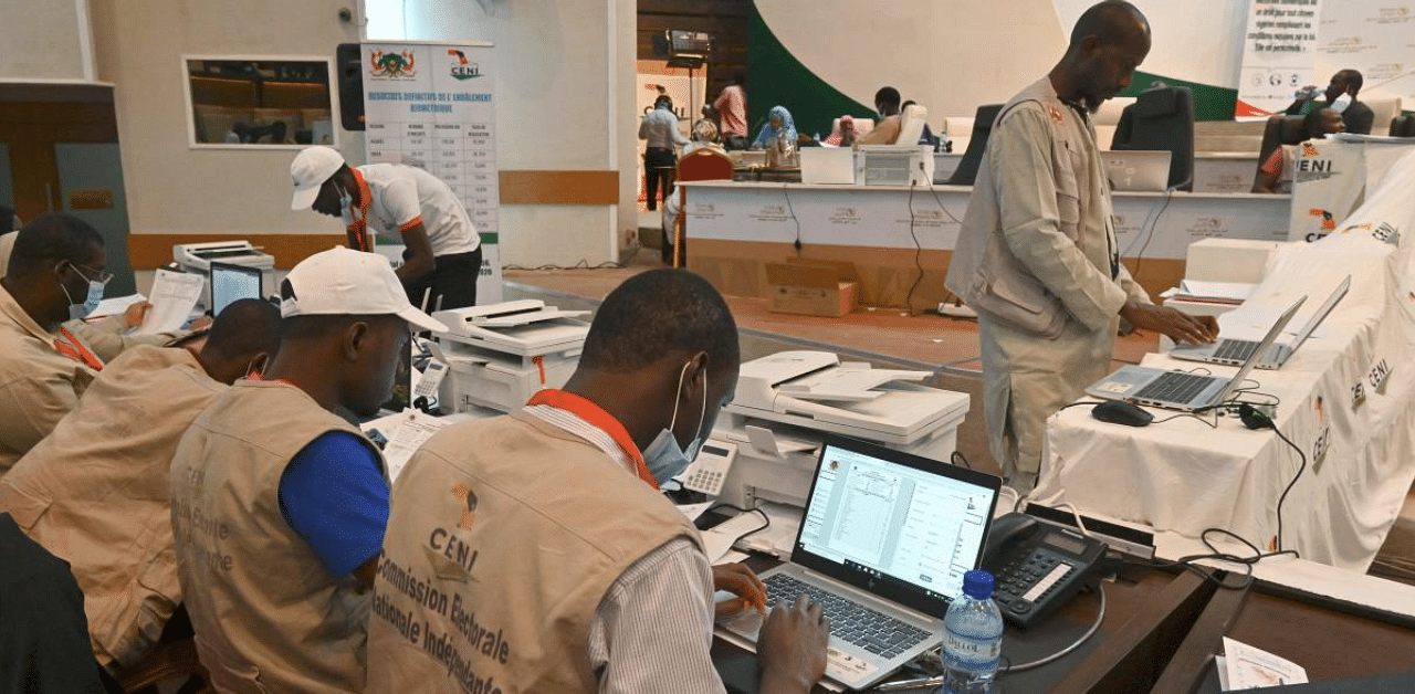 Niger's Independent National Electoral Commission officials compile the results of the presidential and legislative election at the Palais des Congres in Niamey. Credit: AFP Photo