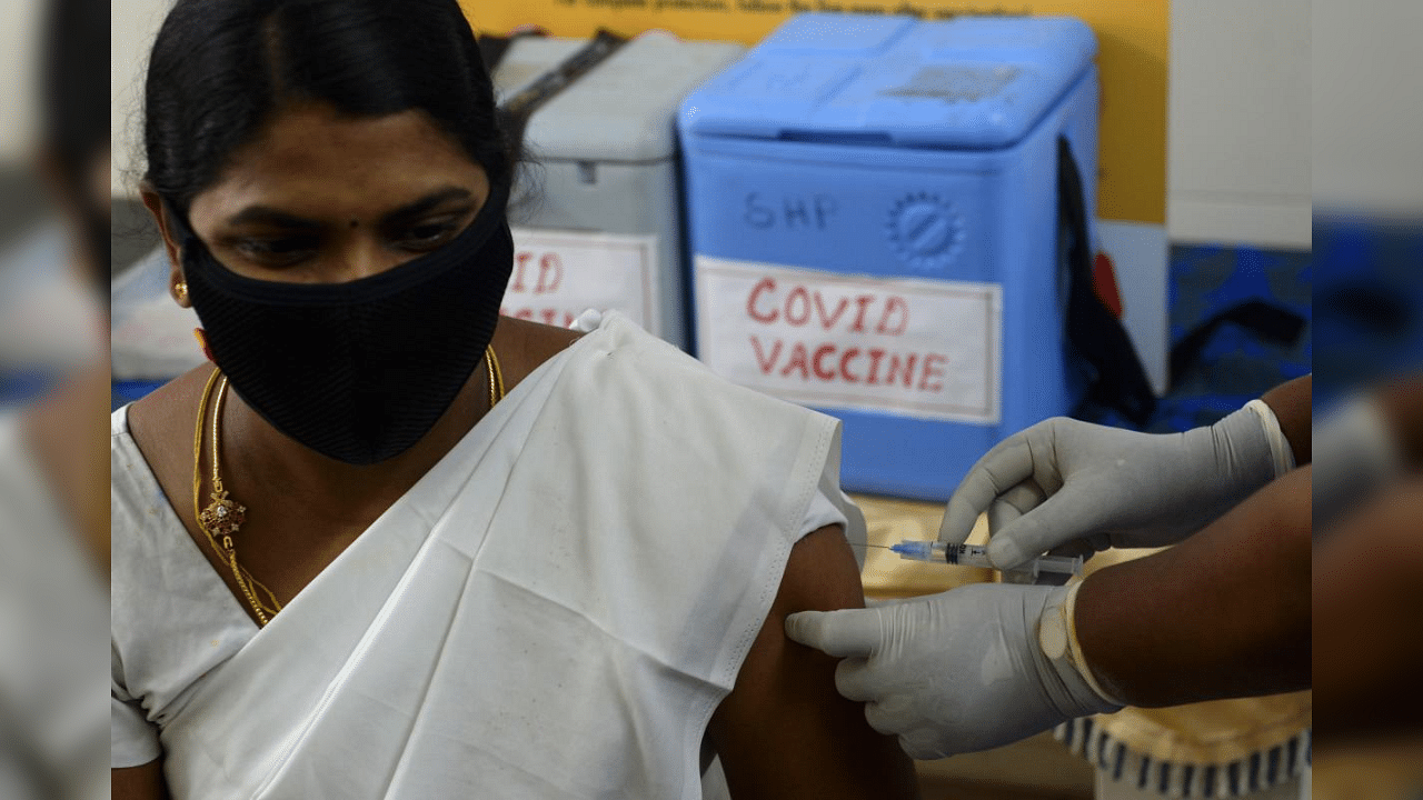 Health officials take part in dry run or a mock drill for Covid-19 coronavirus vaccine delivery at a primary health centre in Chennai on January 2, 2021.  Credit: AFP Photo