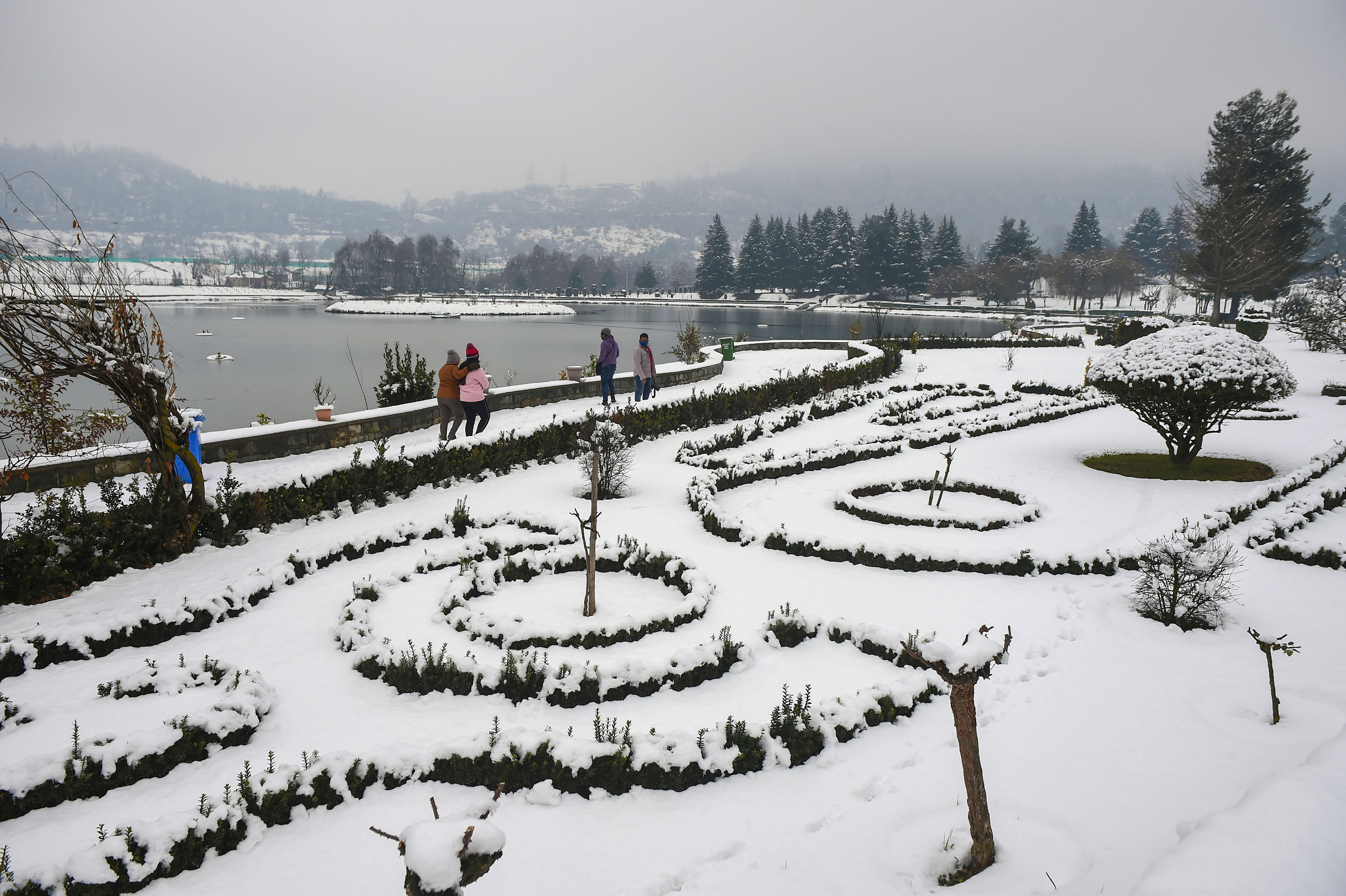 A snow covered park after heavy snowfall, in Srinagar, Sunday, Jan. 3, 2021. Credit: PTI Photo