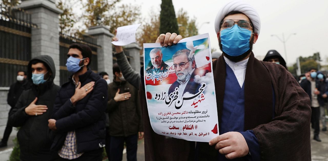 Protesters gather during a demonstration against the killing of Mohsen Fakhrizadeh, Iran's top nuclear scientist, in Tehran. Credit: Reuters Photo