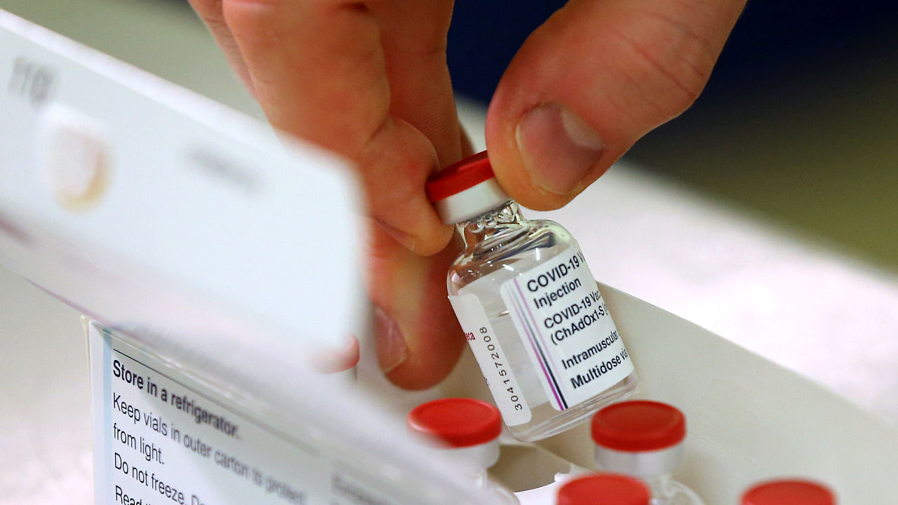 Dose of the Oxford University/AstraZeneca Covid-19 vaccine is displayed from its box. Credit: Reuters Photo