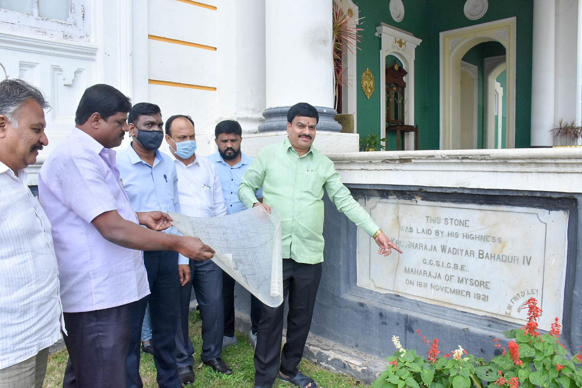 Chairman of Jungle Lodges and Resorts M Appanna inspects Lalitha Mahal Palace Hotel in Mysuru on Monday. Credit: DH.