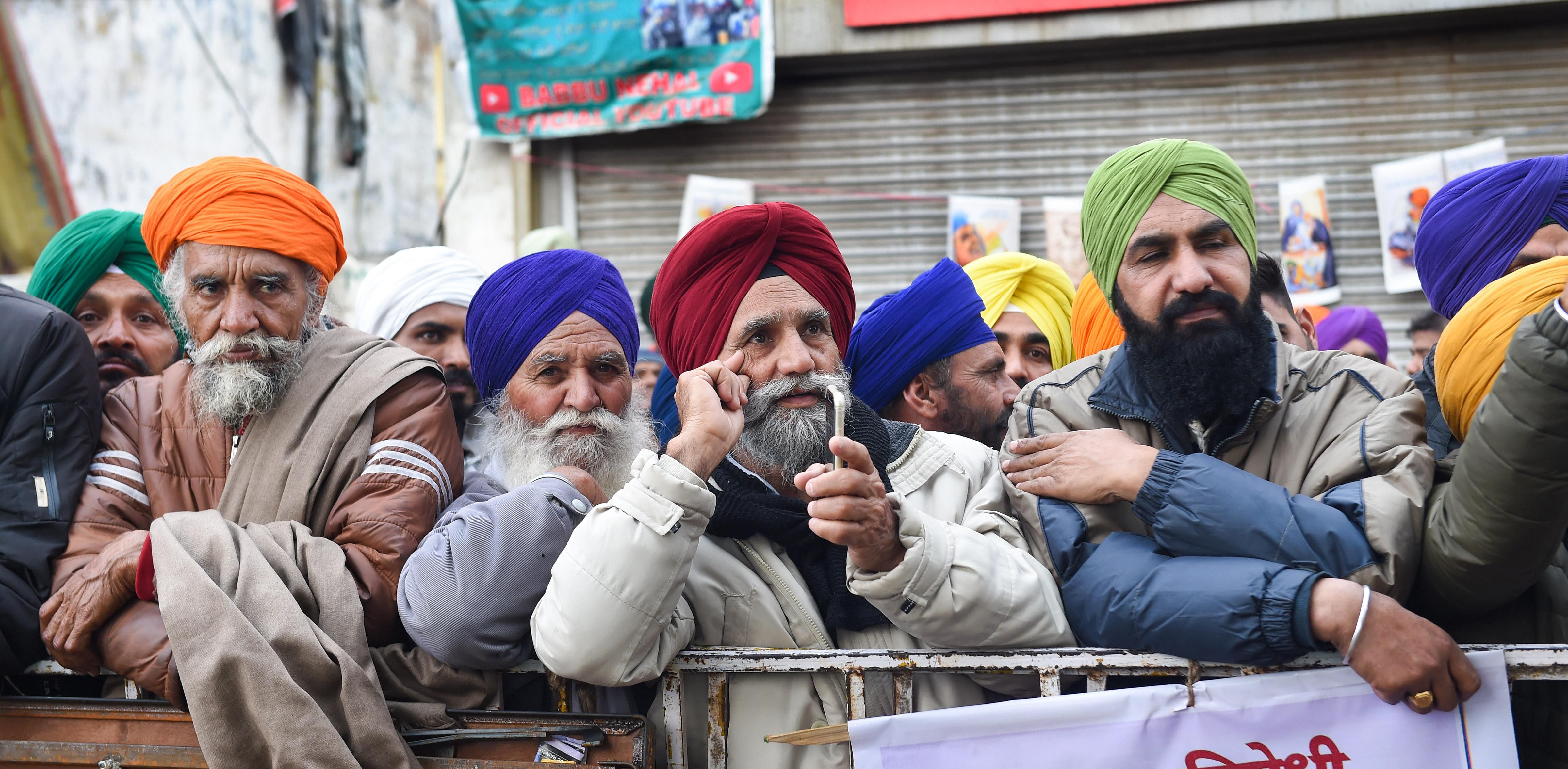 Farmers during their protest against the new farm laws, at Singhu border in New Delhi. Credit: PTI