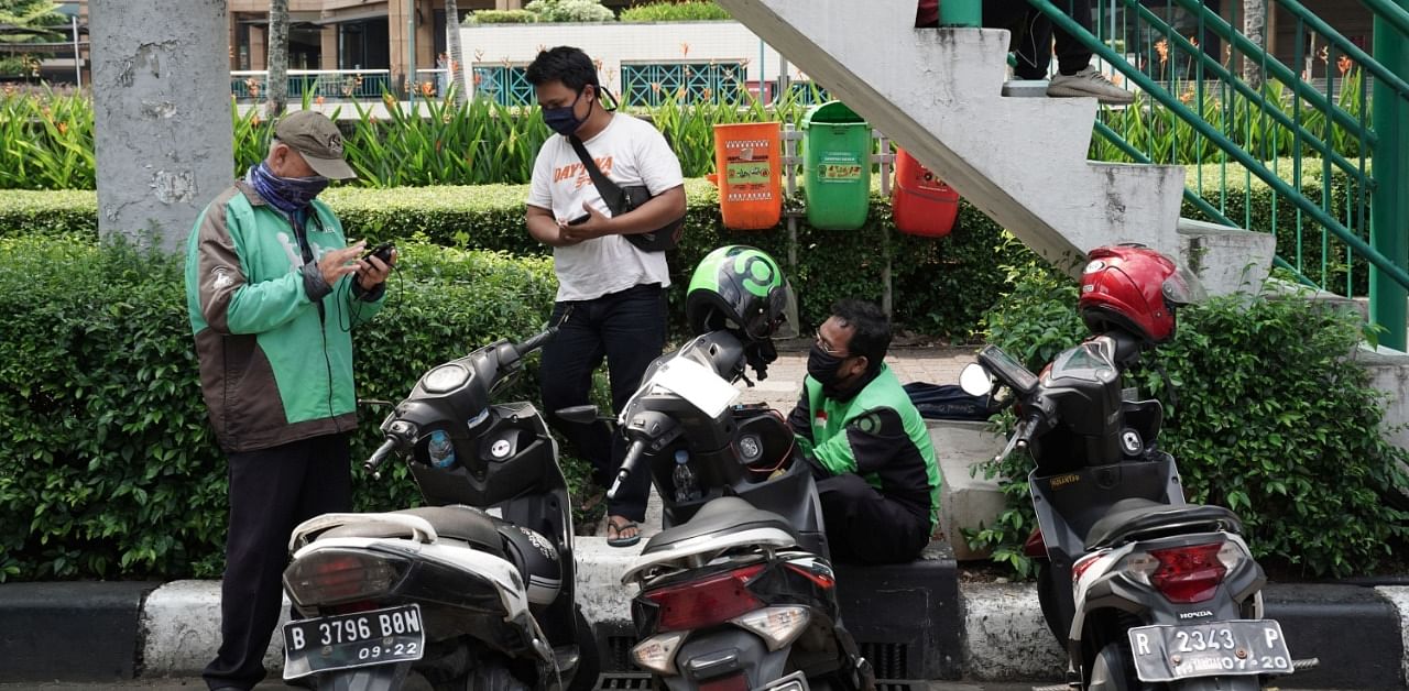 Gojek and Tokopedia have considered a potential merger since 2018, but discussions accelerated after deal talks between Gojek and arch-rival Grab Holdings Inc. reached an impasse, the people said. Credit: Bloomberg Photo