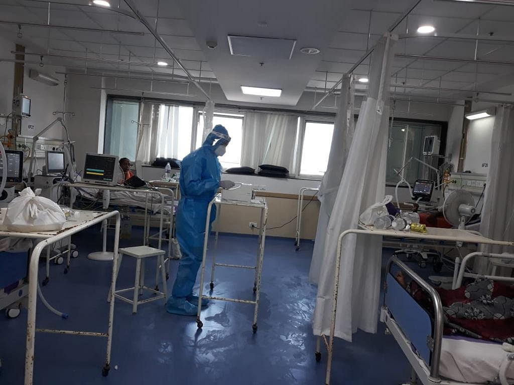 Researchers collecting air samples from hospital wards. Credit: Photo by Special Arrangement