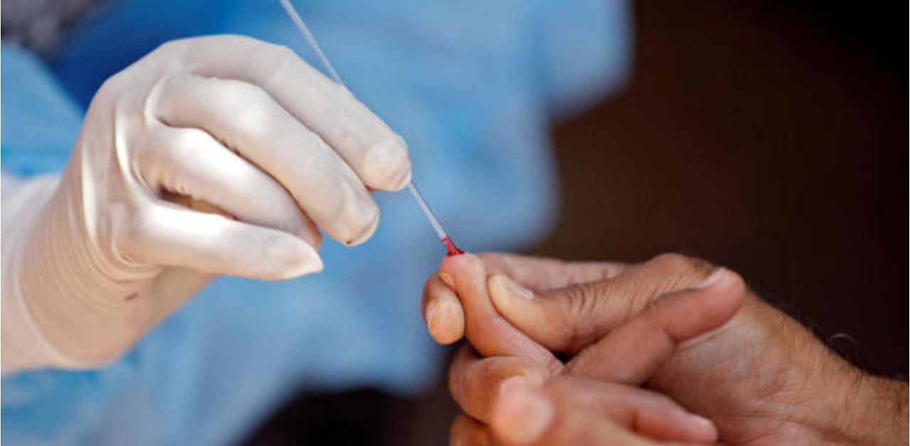 The Centre has set up 10 INSACOG labs for genome sequencing of the UK returnees and their contacts who have tested positive for Covid-19. Credit: Reuters Photo