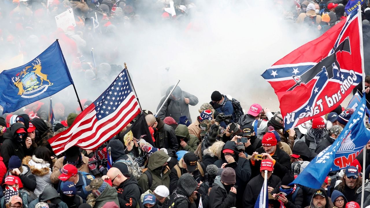 Tear gas is released into a crowd of protesters during clashes with Capitol police at a rally to contest the certification of the 2020 US presidential election results by the US Congress, at the US Capitol Building in Washington, US, January 6, 2021. Credit: Reuters Photo/Shannon Stapleton