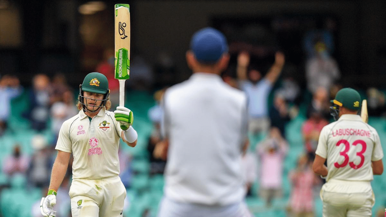 Will Pucovski celebrates after scoring a half-century (50 runs) during the first day of the third cricket Test match between Australia and India at the Sydney Cricket Ground (SCG) in Sydney. Credit: AFP Photo
