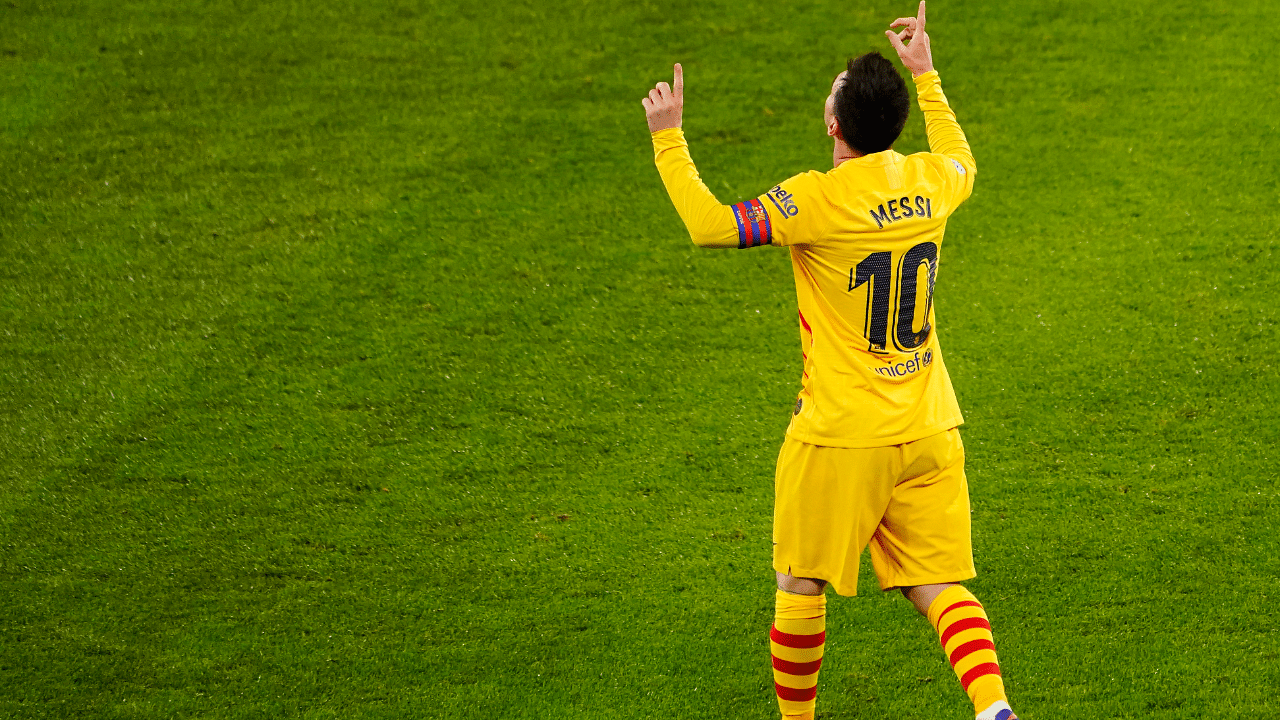 Barcelona's Lionel Messi celebrates scoring their third goal. Credit: Reuters Photo