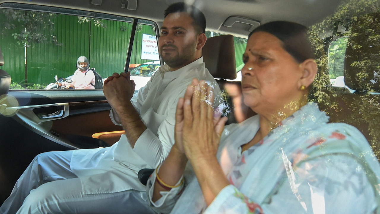 Former Bihar chief minister Rabri Devi with her son and Rashtriya Janata Dal (RJD) leader Tejashwi Yadav. Credit: PTI File Photo/