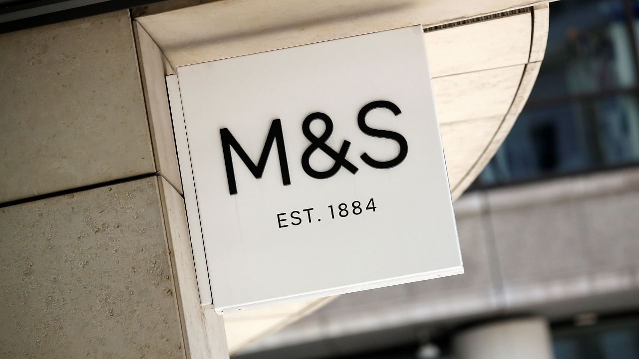 In this file photo taken on July 20, 2020 A logo is pictured on a sign outside an M&S (Marks and Spencer) store in central London. Credit: AFP Photo