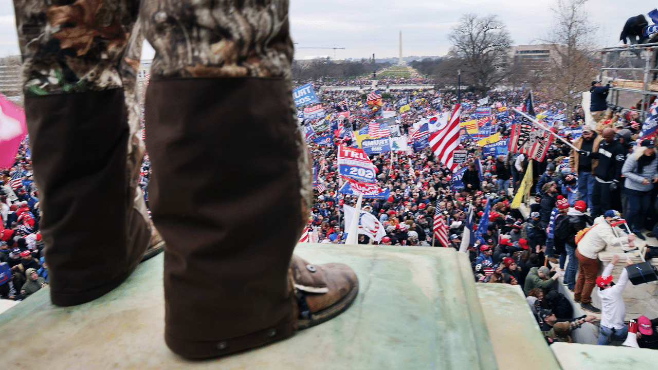 Thousands of Donald Trump supporters storm the United States Capitol building following a "Stop the Steal" rally. Credit: AFP Photo