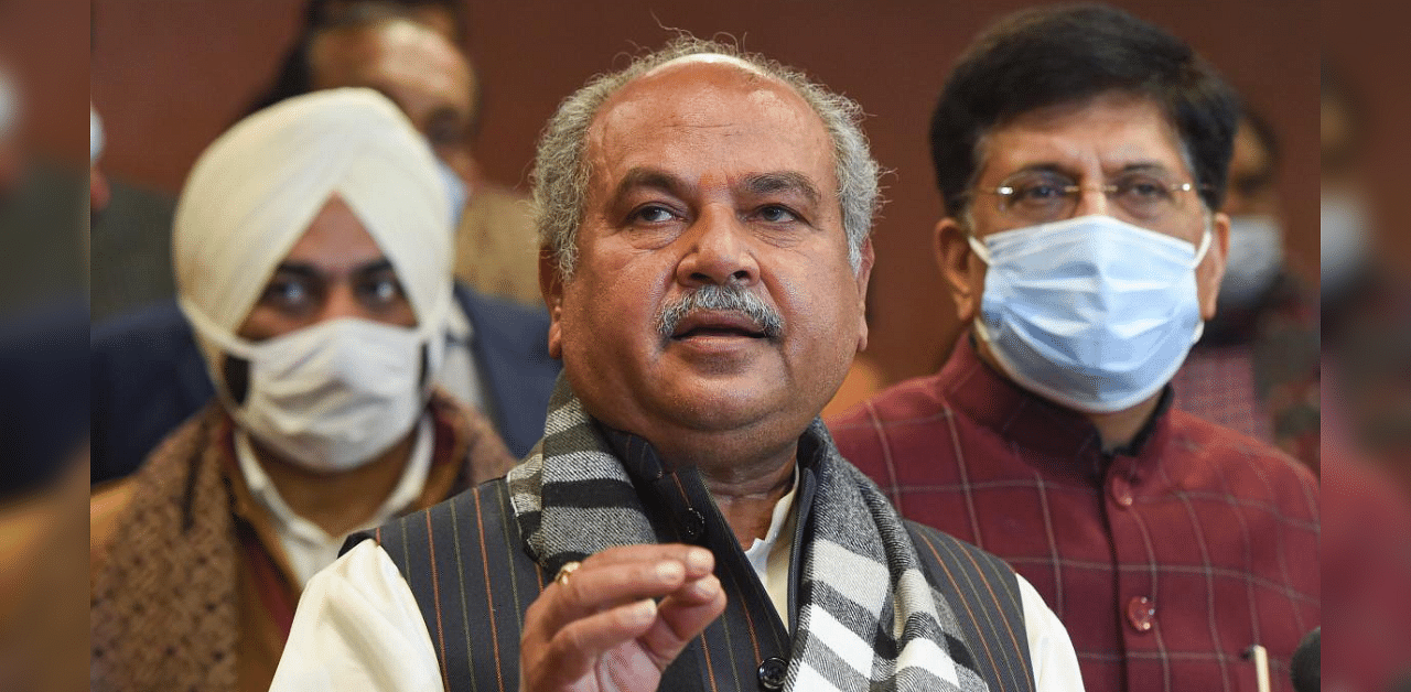 Union Minister for Agriculture & Farmers Welfare Narendra Singh Tomar (C) addresses media after the 8th round of talks between the farmer leaders and the Centre. Credit: PTI Photo