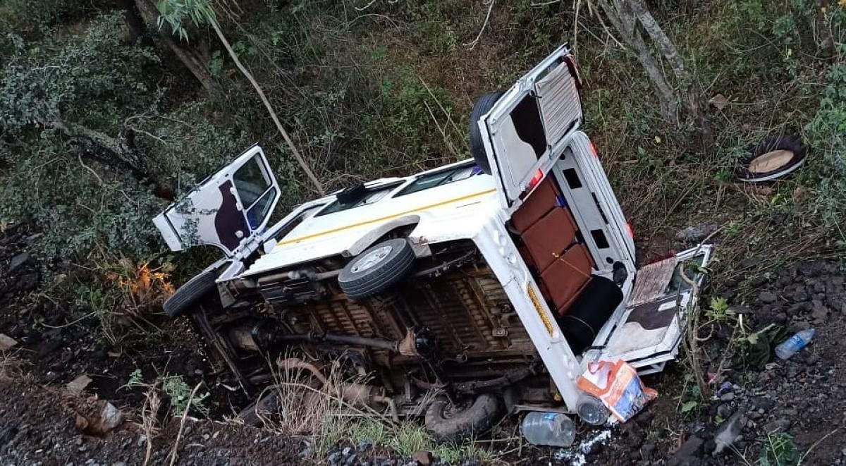The vehicle that overturned near Suvarnavathi dam in Chamarajanagar district, claiming three lives, on Friday morning. DH PHOTO