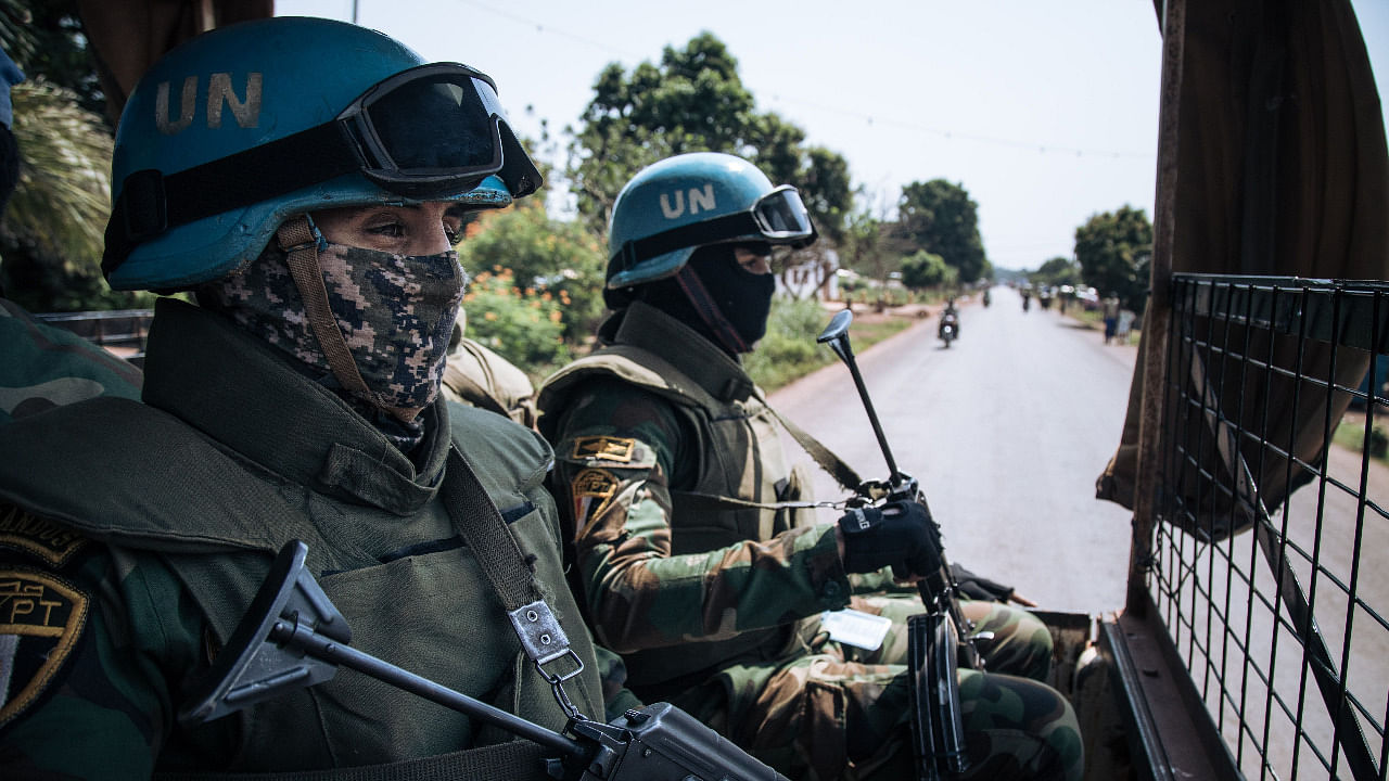 Egyptian commandos of the United Nations Multidimensional Integrated Stabilization Mission in the Central African Republic (MINUSCA) patrol on the outskirts of Bangui, the capital of the Central African Republic. Credit: AFP Photo