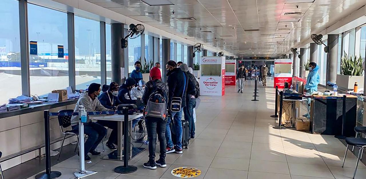 Covid-19 testing setup, handled by Genestrings Diagnostic Centre, for the passenger coming from United Kingdom, amid mounting concern over the new strain of the virus, at Delhi Airport in New Delhi, Tuesday, Dec. 22, 2020. Credit: PTI Photo