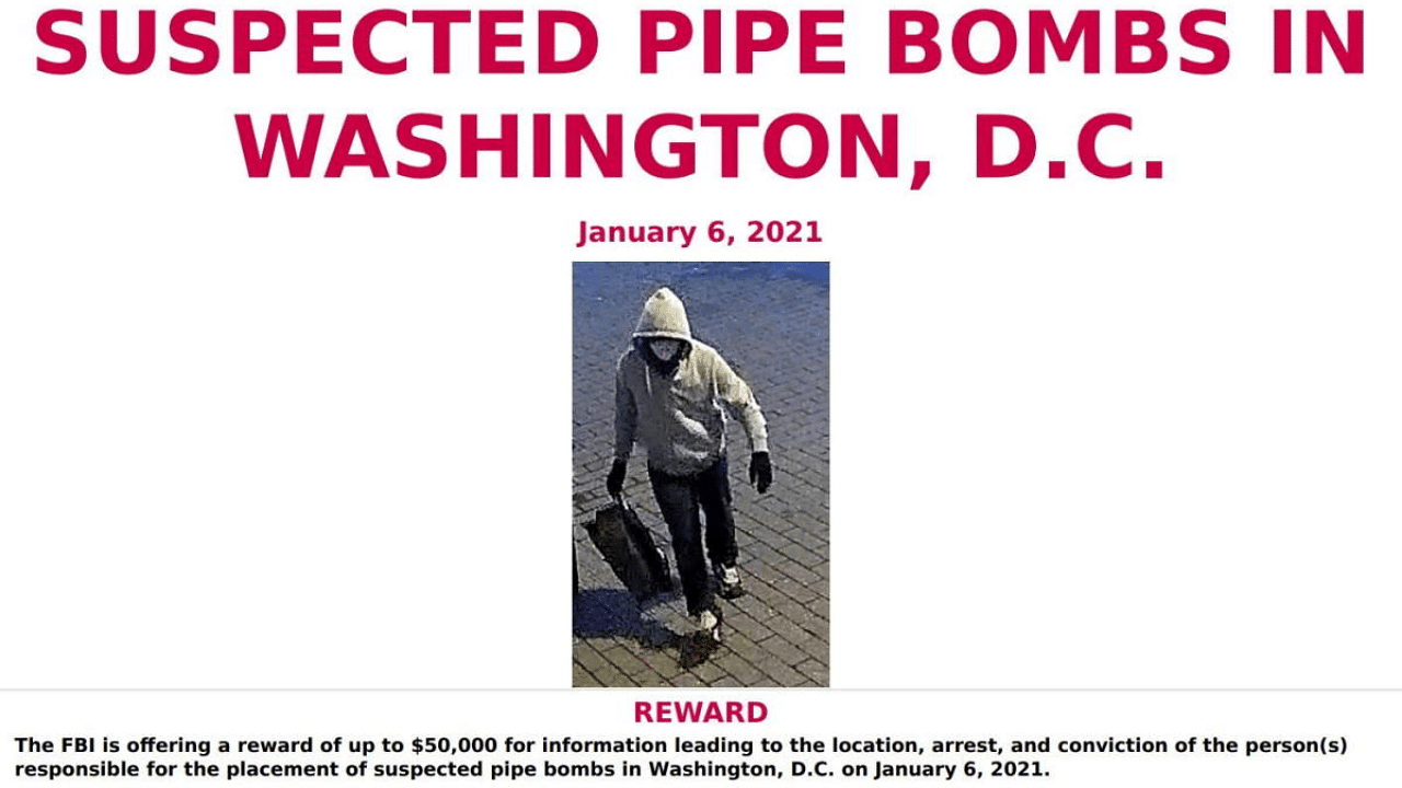 A notice requesting information on person(s) responsible for pipe bombs left at the Republican National Committee (RNC) and Democratic National Committee (DNC) headquarters features a surveillance photograph taken in Washington, US. Credit: Reuters Photo