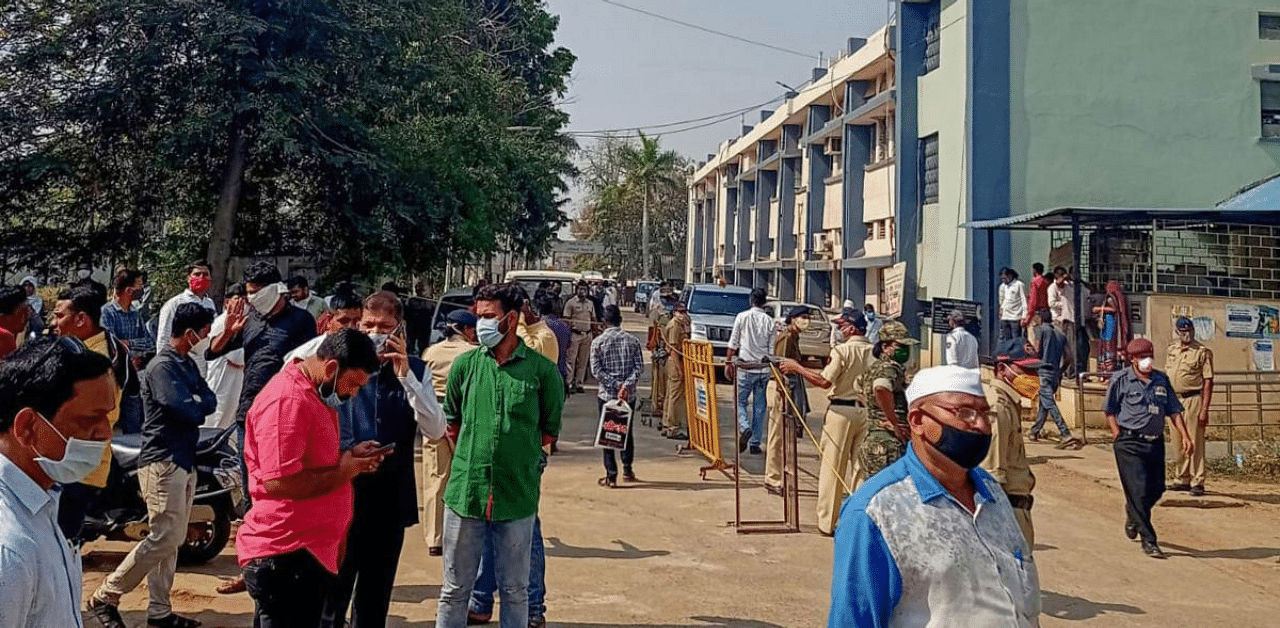 Police personnel guard outside the Bhandara district General Hospital after a fire broke out in its new born babies care unit in the wee hours, in Bhandara district of Maharashtra. Credit: PTI Photo